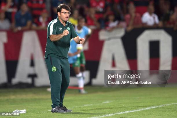 Coach Emerson Cris of Brazil's Chapecoense gestures during their 2017 Copa Sudamericana football match against Brazil's Chapecoense held at Ilha do...