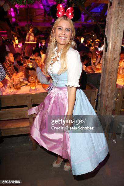 Jennifer Knaeble wears Minnie Mouse ears during the "Blond Wies'n" as part of the Oktoberfest at Theresienwiese on September 20, 2017 in Munich,...