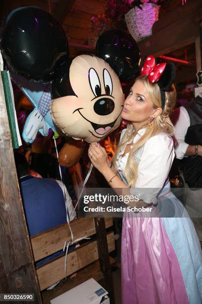 Jennifer Knaeble with Mickey Mouse balloon during the "Disney Wies'n" as part of the Oktoberfest at Theresienwiese on September 20, 2017 in Munich,...