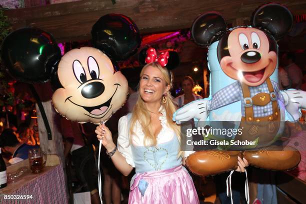 Jennifer Knaeble with Mickey Mouse balloon during the "Disney Wies'n" as part of the Oktoberfest at Theresienwiese on September 20, 2017 in Munich,...