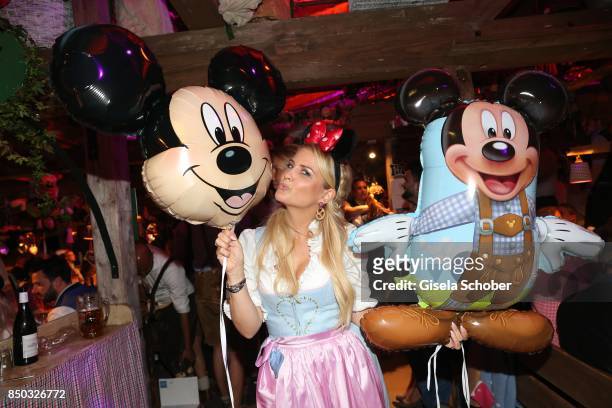 Jennifer Knaeble with Mickey Mouse balloon during the "Disney Wies'n" as part of the Oktoberfest at Theresienwiese on September 20, 2017 in Munich,...