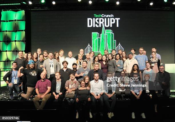 The TechCrunch staff pose for a photo onstage during TechCrunch Disrupt SF 2017 at Pier 48 on September 20, 2017 in San Francisco, California.