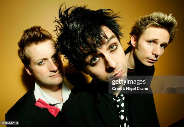 Photo of Billie Joe ARMSTRONG and Mike DIRNT and GREEN DAY and Tre COOL; L-R. Tre Cool, Billie Joe Armstrong, Mike Dirnt