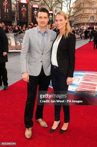 Tom Chambers and wife Clare Harding arriving for the premiere of Iron Man 3 at the Odeon Leicester Square, London.