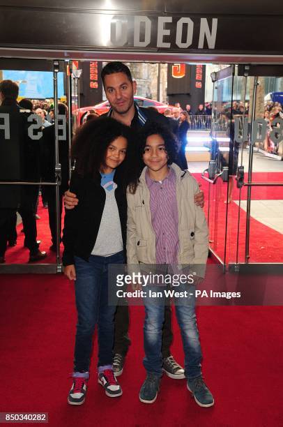 Ol Parker with children Ripley Parker and Nico Parker arriving for the premiere of Iron Man 3 at the Odeon Leicester Square, London.