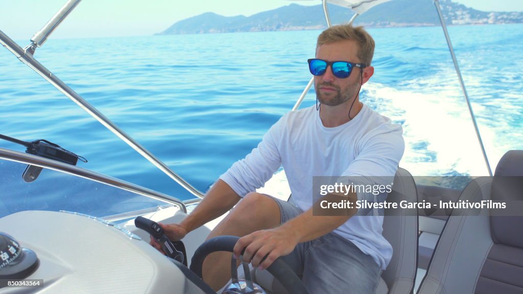 Beautiful young couple relaxed in yatch