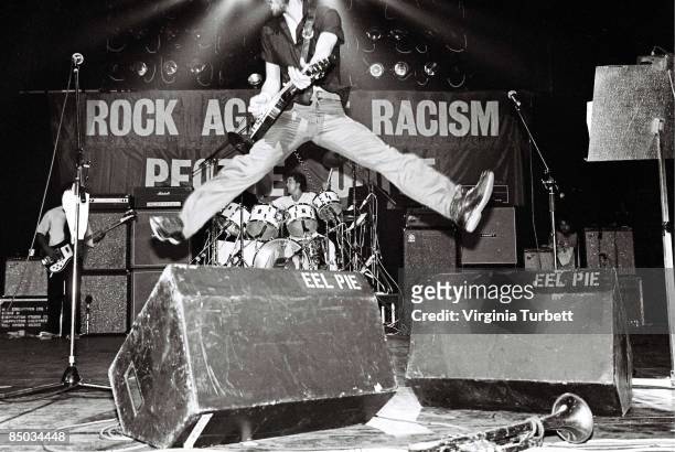 Pete Townshend Of The Who jumping in the air while performing at a Rock Against Racism Southall benefit show, The Rainbow Theatre, London, 13th July...