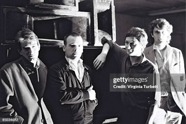 Photo of Dave ALLEN and GANG OF FOUR and Jon KING and Andy GILL; L-R. Andy Gill, Hugo Burnham, Dave Allen, Jon King backstage at the Rock Against...