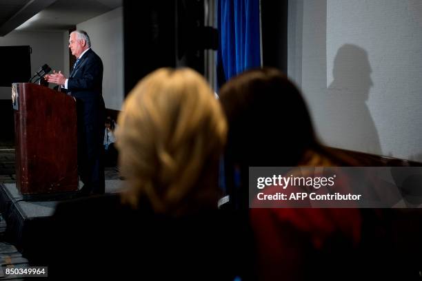 Secretary of State Rex Tillerson speaks as his spokesperson Heather Nauert and White House Press Secretary Sarah H. Sanders talk to each other at the...