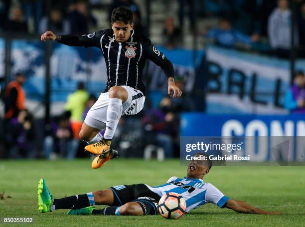 Fagner of Corinthians jumps over Matias Zaracho of Racing Club during a second leg match between Racing Club and Corinthians as part of round of 16...