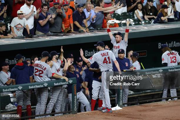 Starting pitcher Chris Sale of the Boston Red Sox celebrates after striking out Ryan Flaherty of the Baltimore Orioles for his 300th strike out of...