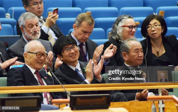 Tomihisa Taue , mayor of the atomic-bombed southwestern Japan city of Nagasaki, attends the signing ceremony of the world's first treaty to...