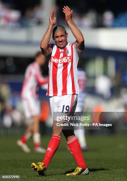 Stoke City's Jon Walters celebrates with fans after their 2-0 win over Queens Park Rangers during the Barclays Premier League match at Loftus Road,...