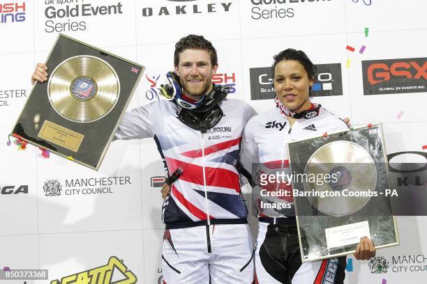 Great Britain's Liam Phillips and Shanaze Reade celebrate with their medals at the end of day two of the UCI BMX Supercross World Championship at the...