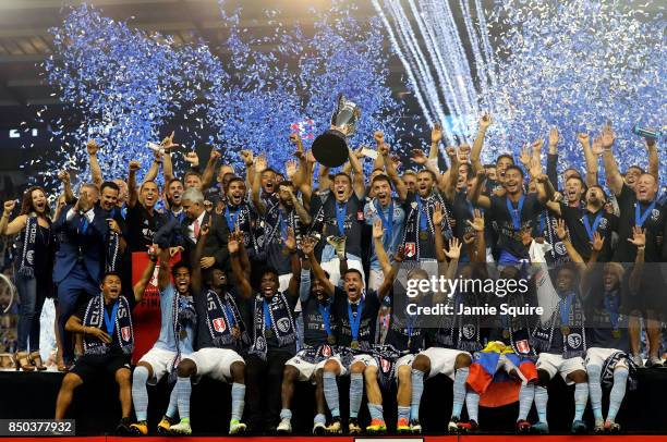 Matt Besler and Sporting Kansas City celebrate with the trophy after they defeated New York Red Bulls 2-1 to win the 2017 U.S Open Cup Final at...