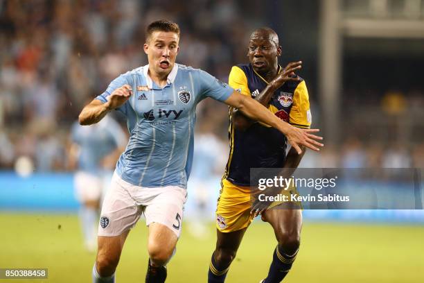 Matt Besler of Sporting Kansas City and Bradley Wright-Phillips of New York Red Bulls fight for the ball in the US Open Cup Final match at Children's...