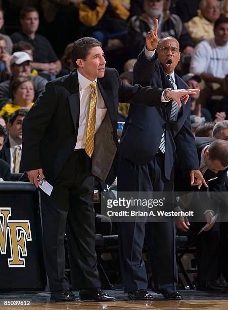Wake Forest Demon Deacons head coach Dino Gaudio and assistant head coach Jeff Battle yell out instructions during first half action versus the...