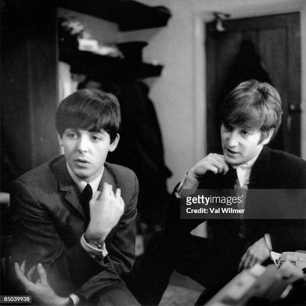 30th DECEMBER: Paul McCartney and John Lennon from The Beatles posed backstage at the Finsbury Park Astoria, London during the band's Christmas Show...