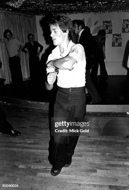 Dancers showing off the characteristic fashions and energetic dance moves of Northern Soul on the dance floor at an 'all-dayer', at The Palais,...