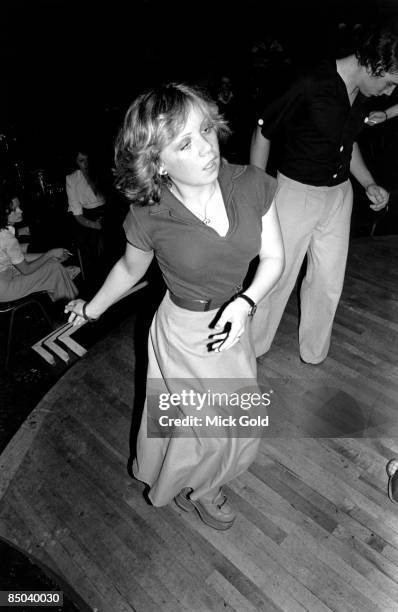 Dancers showing off the characteristic fashions and energetic dance moves of Northern Soul on the dance floor at an 'all-dayer', at The Palais,...