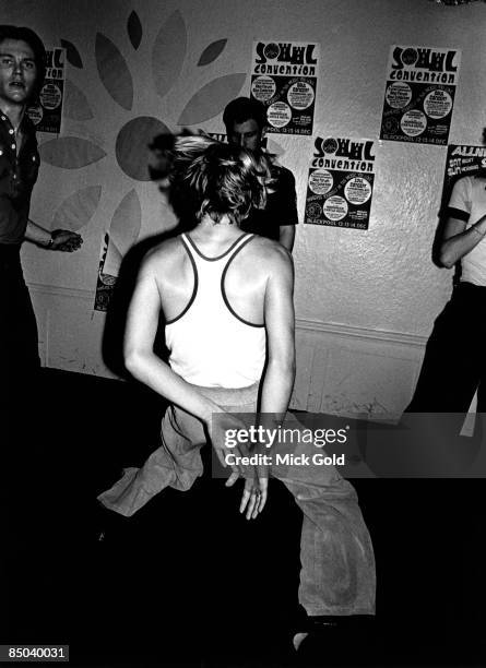 Dancers showing off the characteristic fashions and energetic dance moves of Northern Soul on the dance floor at an 'all-dayer', at The Palais,...