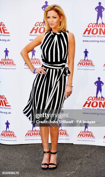 Sarah Harding is unveiled as the new ambassador for the armed forces charity Coming Home, which raises funds to provide homes for wounded soldiers...