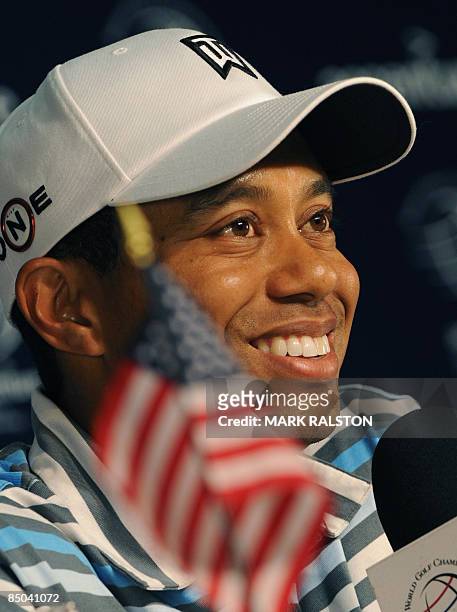 World number one Tiger Woods smiles during a press conference before the start of the Accenture Match Play Championship at the Ritz-Carlton Golf Club...
