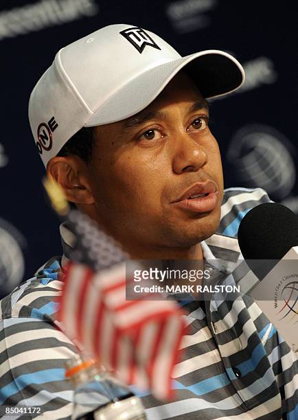 Tiger Woods pauses during a press conference before the start of the Accenture Match Play Championship at the Ritz-Carlton Golf Club at Dove Mountain...