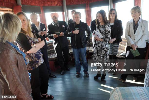 Authors including Mark HAddon and Lucy Fleming attend the World Book Night 2013 'Casino Royale' cocktail party at the South Bank Centre, London.