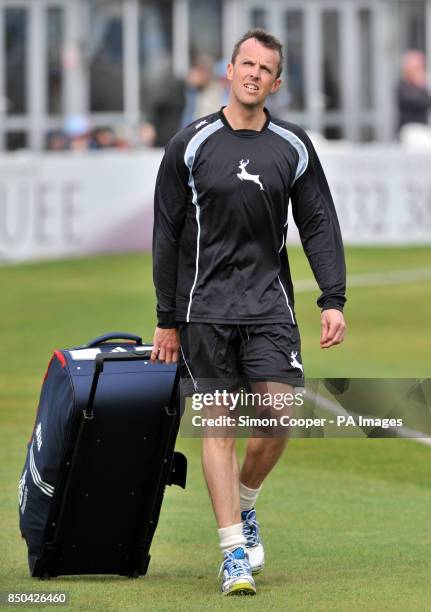 Nottinghamshire's Graeme Swann returns form using the practice nets during the LV= County Championship, Division One match at the County Ground,...