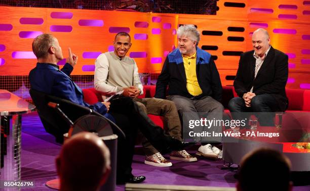 Graham Norton, Lewis Hamilton, Pedro Almodovar and Dara O'Briain during the filming of the Graham Norton show at the London Studios in London.