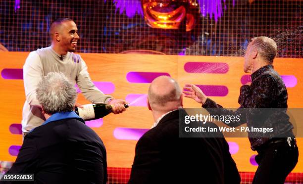 Graham Norton, Lewis Hamilton, Pedro Almodovar and Dara O'Briain during the filming of the Graham Norton show at the London Studios in London.