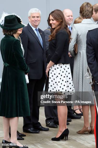 The Duchess of Cambridge meets dignitaries as she arrives for her visit to Warner Bros studios in Leavesden, Herts where the popular Harry Potter...