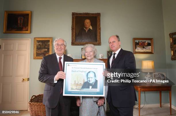 Mervyn King, the Governor of the Bank of England with lady Soames, the only surviving child of Winston Churchill and Randolph Churchill unveiling the...