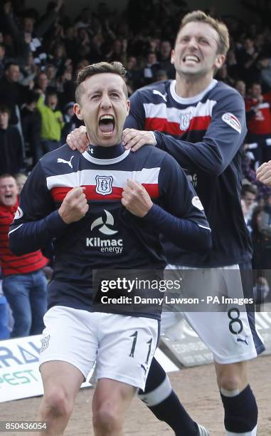 Dundee's Ryan Conroy celebrates his goal with team mate Kevin McBride during the Clydesdale Bank Scottish Premier League match at Dens Park, Dundee.