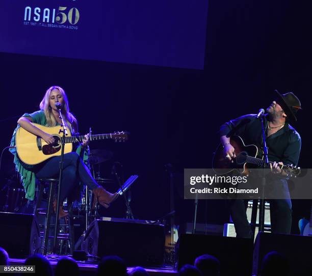 Singers/Songwriters Jessi Alexander and Lee Brice perform during NSAI 50 Yearsof Songs at Ryman Auditorium on September 20, 2017 in Nashville,...