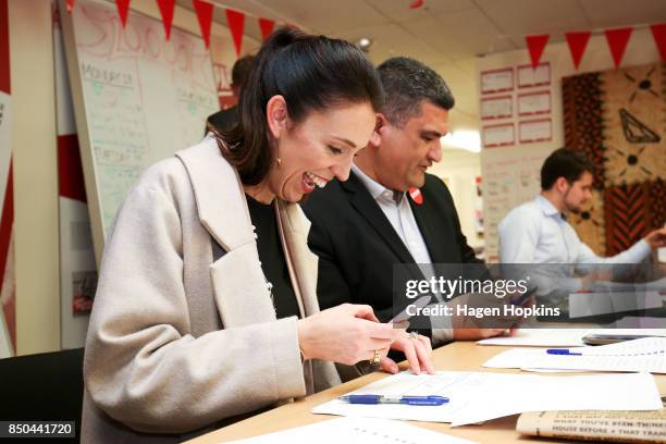 Labour leader Jacinda Ardern makes calles with Rongotai candidate Paul Eagle during a visit to Eagle's phone bank on September 21, 2017 in...