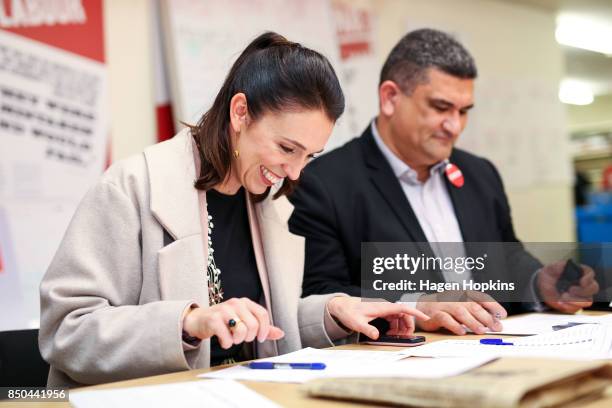 Labour leader Jacinda Ardern makes calles with Rongotai candidate Paul Eagle during a visit to Eagle's phone bank on September 21, 2017 in...