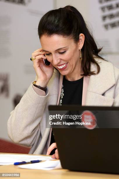 Labour leader Jacinda Ardern makes a campaign call during a visit to Rongotai candidate Paul Eagle's phone bank on September 21, 2017 in Wellington,...