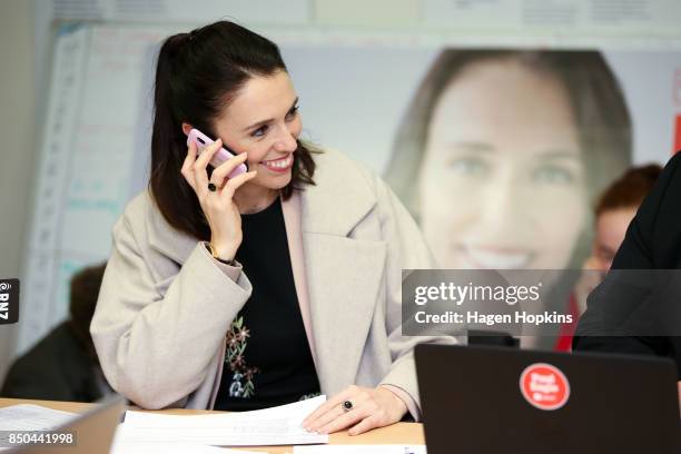 Labour leader Jacinda Ardern makes a campaign call during a visit to Rongotai candidate Paul Eagle's phone bank on September 21, 2017 in Wellington,...