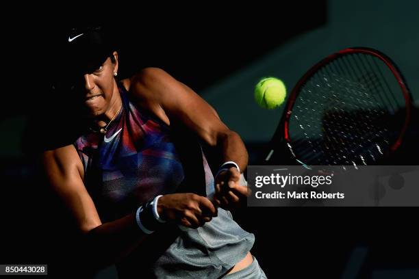 Caroline Garcia of France plays a backhand against Kurumi Nara of Japan during day four of the Toray Pan Pacific Open Tennis At Ariake Coliseum on...