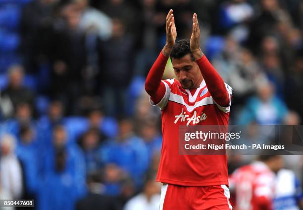 Queens Park Rangers' Jay Bothroyd applauds the traveling fans after his side relegation during the Barclays Premier League match at the Madejski...