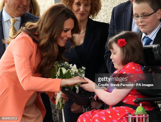 The Duchess of Cambridge meets Sally Evans aged 8 from Salisbury as she visits Naomi House Children's Hospice in Winchester, Hampshire, during...