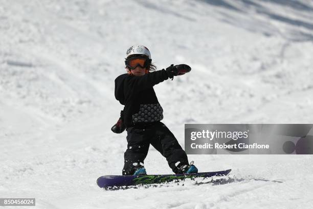 Young boy snowboards on September 21, 2017 in Mount Buller, Australia. Australians are enjoying one of the best ski seasons after the best snowfall...