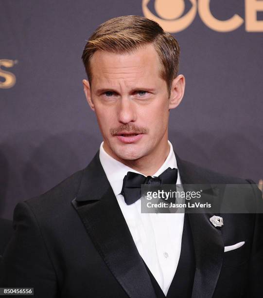 Actor Alexander Skarsgard poses in the press room at the 69th annual Primetime Emmy Awards at Microsoft Theater on September 17, 2017 in Los Angeles,...