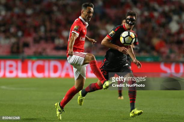 Benficas forward Jonas from Brazil and Bragas midfielder Nikola Vukcevic from Montenegro during the Portuguese Cup 2017/18 match between SL Benfica v...