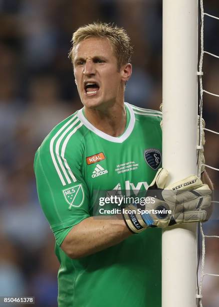 Sporting Kansas City goalkeeper Tim Melia calls out the defense before a free kick in the first half of the Lamar Hunt US Open Cup final between the...