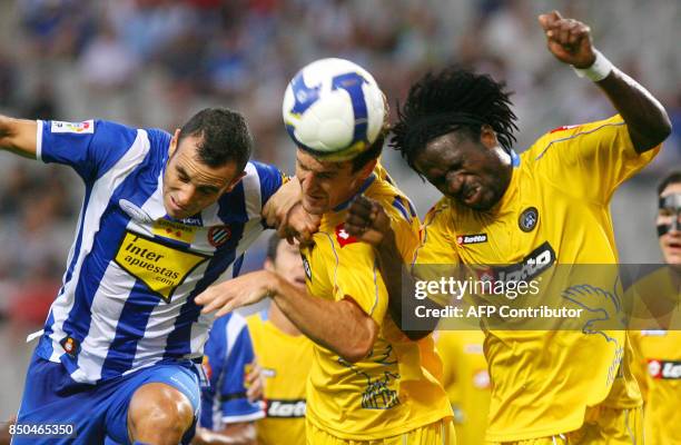 Espanyol's Moises Hurtado fightS for the ball with Udinese Motta and Obodo during their 35th Trophy Ciutat de Barcelona friendly football match...