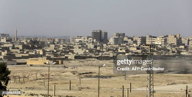 General view of the eastern Syrian city of Deir Ezzor on September 20, 2017 as Syrian government forces continue to press forward with Russian air...