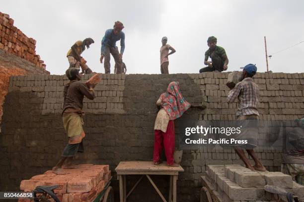 These workers are carrying out back-breaking and exhausting labour in the most risky conditions even under the heat of the sun. They work long hours...